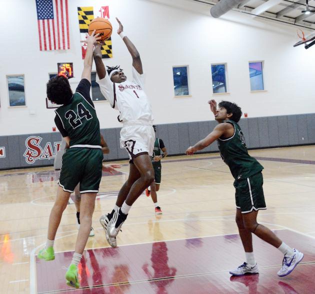 Action photos of Saint James-Georgetown Day boys basketball